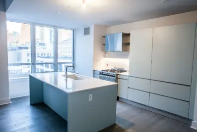 The Boerum — kitchen interior with center island and city views