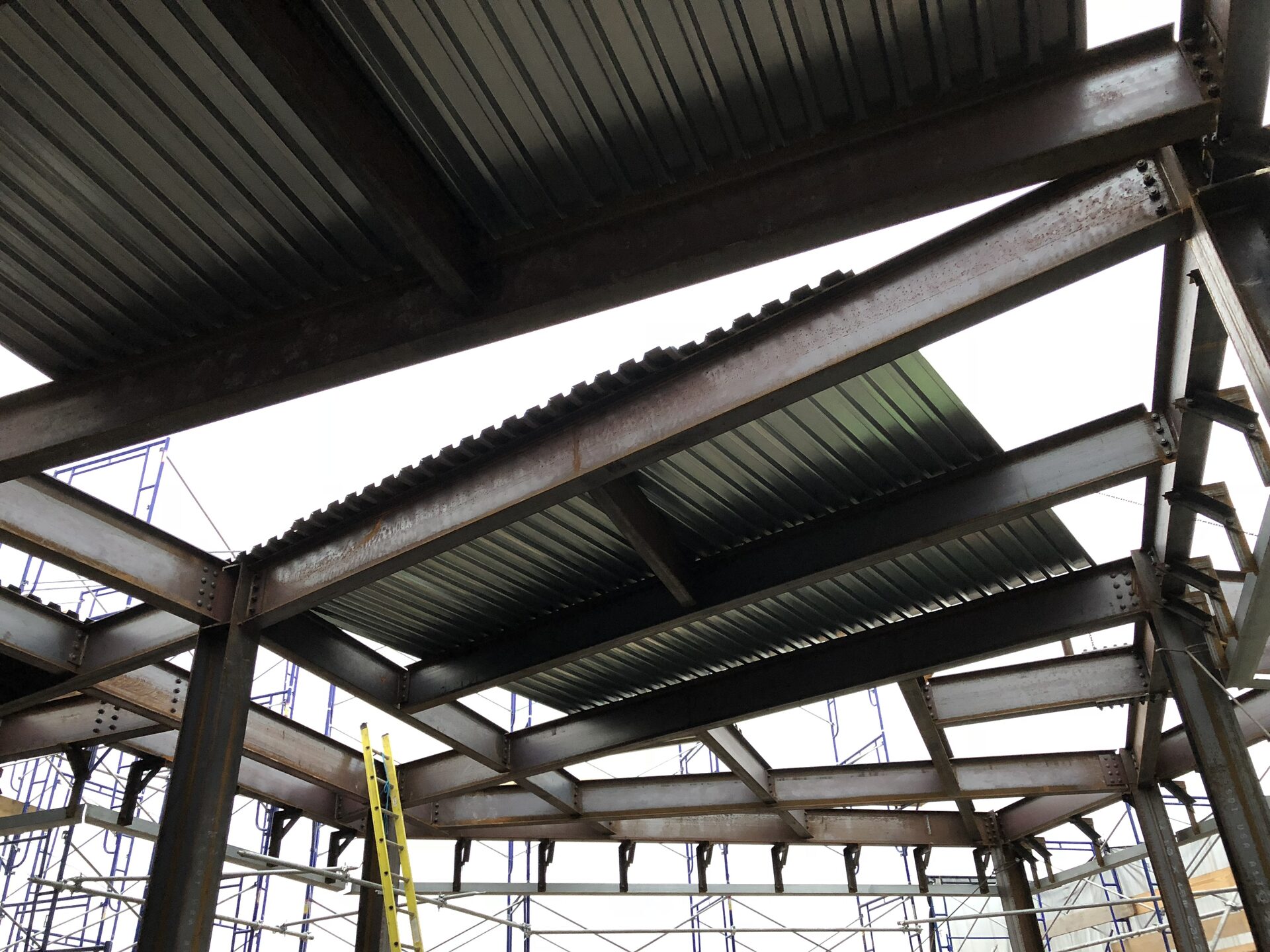 The Oriana — structural steel beams and decking during the vertical expansion above the existing tower